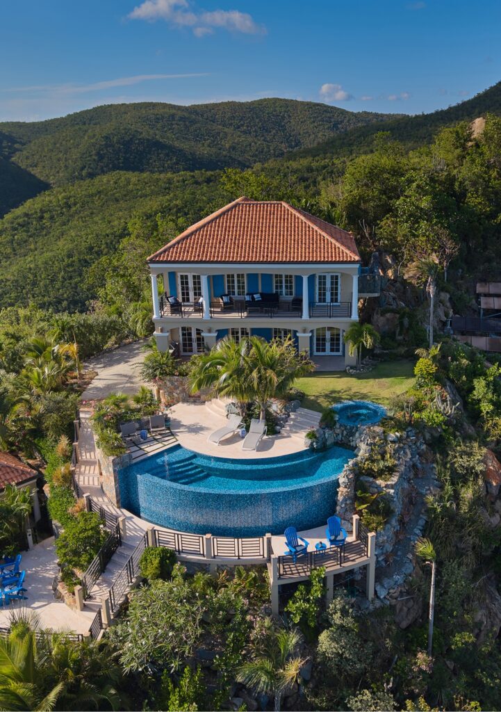 Aerial view of a Clifftop Estate hillside villa with infinity edge pool, St. John USVI