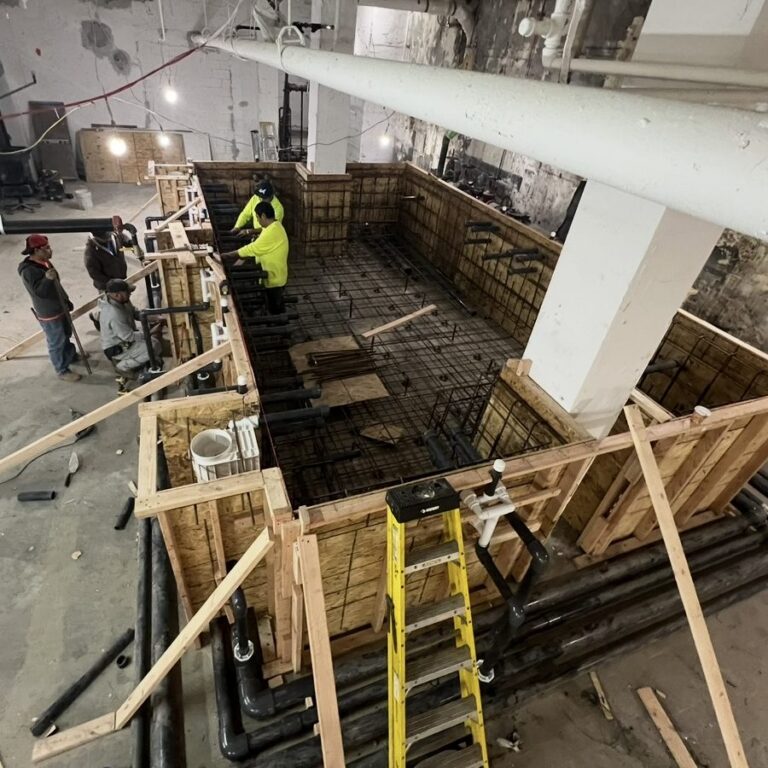 Commercial pool shell construction with formwork and rebar by Aquatics International Group