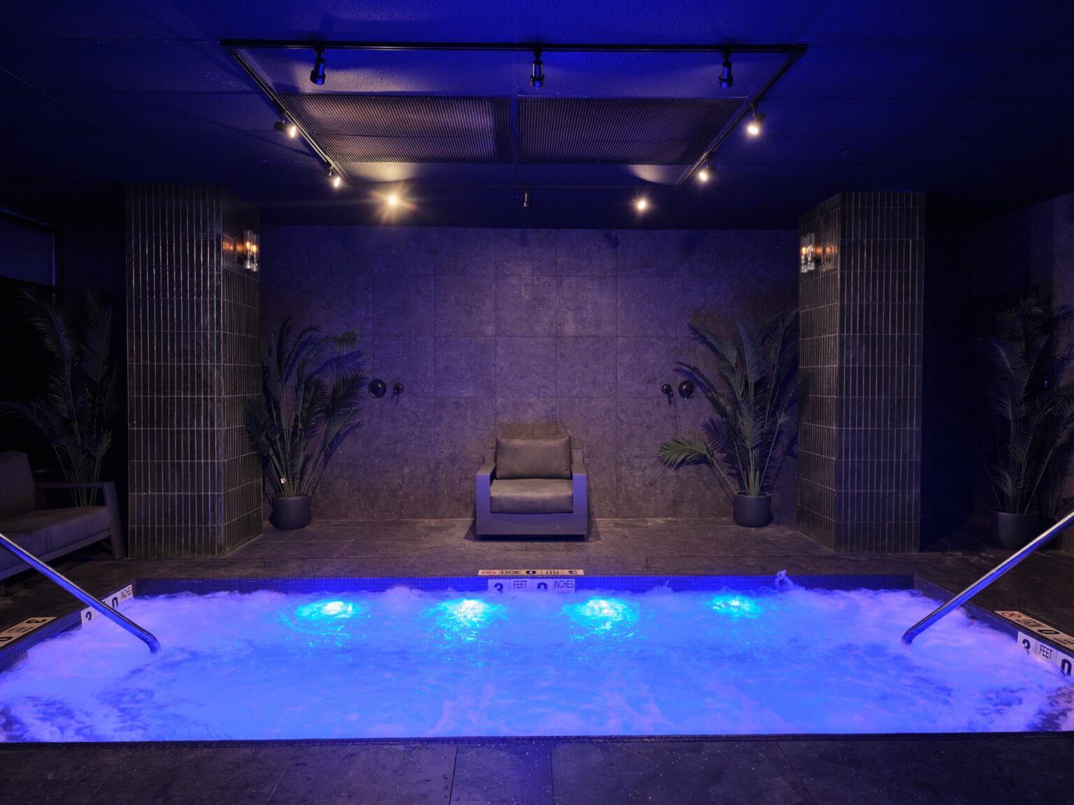 TMPL NYC commercial hydrotherapy spa pool with massage jets, aquatic wellness facility by Aquatics International Group