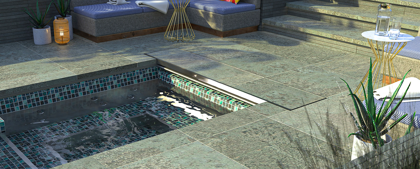 Rooftop terrace spa with green glass mosaic tile and stone deck, rooftop pool and spa design by Aquatics International Group
